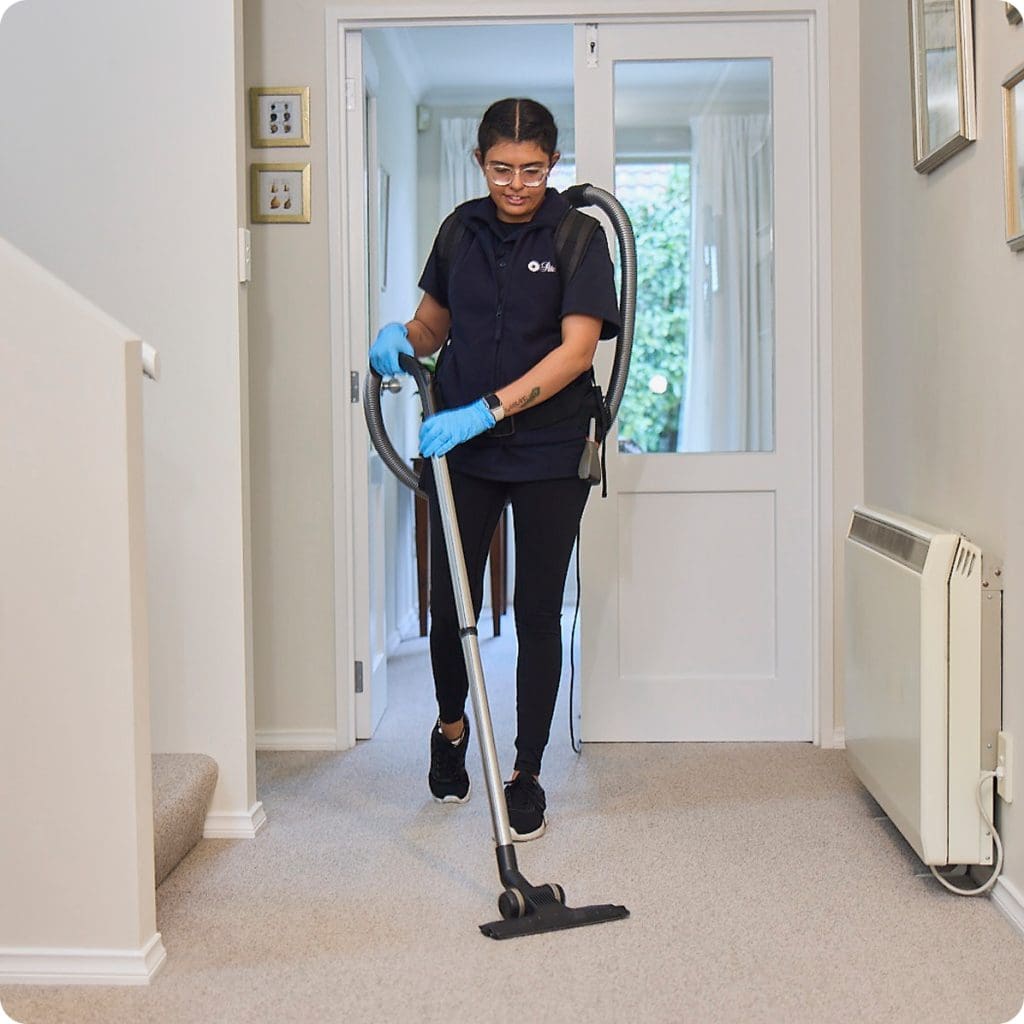 Interior House Cleaning 2 women carpet vacum